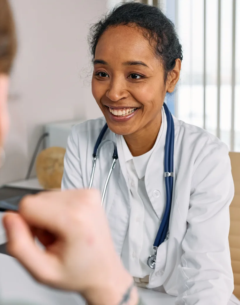 Huisarts in gesprek met een patiënt